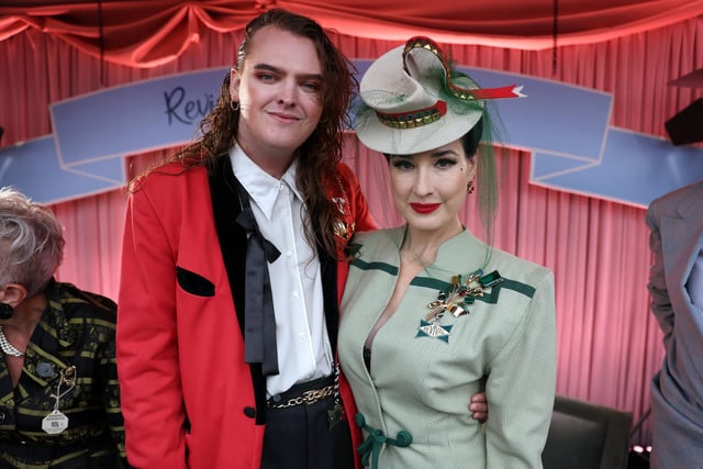 Dita Von Teese poses with Chandler Tregaskes at Goodwood Revival on Friday, September 6. Photo: Kieran Cleeves/PA Wire