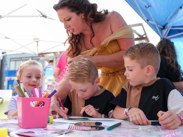 Belle with from left, Erin, 4, and twins George and Tommy, 5. Waterlooville Music and Arts Festival took place in the precinct, Waterlooville
Picture: Chris Moorhouse (170824-67)