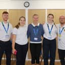Staff members at the event.