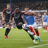 Dane Scarlett battles with Shrewsbury's Chey Dunkley in this afternoon's League One encounter. Picture: Jason Brown/ProSportsImages