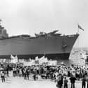 Entering the harbour is HMS Invincible getting a warm welcome back from the Falklands in 1982. The News PP4870
