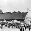 Entering the harbour is HMS Invincible getting a warm welcome back from the Falklands in 1982. The News PP4870