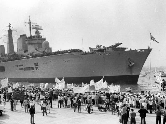 Entering the harbour is HMS Invincible getting a warm welcome back from the Falklands in 1982. The News PP4870
