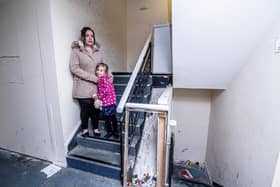 Portsmouth central apartment block, Windsor House in dire state on Wednesday 5 January 2022. Pictured: Leah Hardwick with her daughter, Ayra 5. Picture: Habibur Rahman