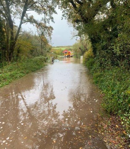 The flooded road is closed.