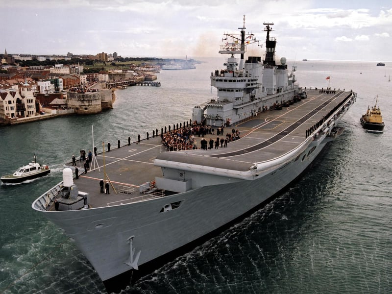 HMS Ark Royal returns to Portsmouth after her refit in Scotland.