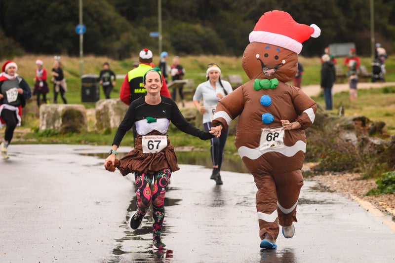 Charlotte and Laura Grimwood get into the festive spirit at the Christmas Pud 5k, Stokes Bay, Gosport