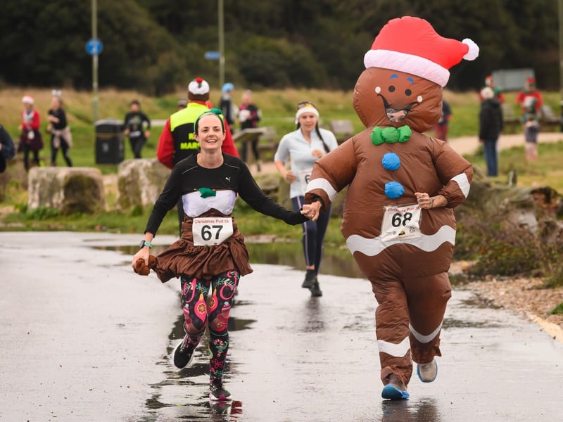 Charlotte and Laura Grimwood get into the festive spirit at the Christmas Pud 5k, Stokes Bay, Gosport