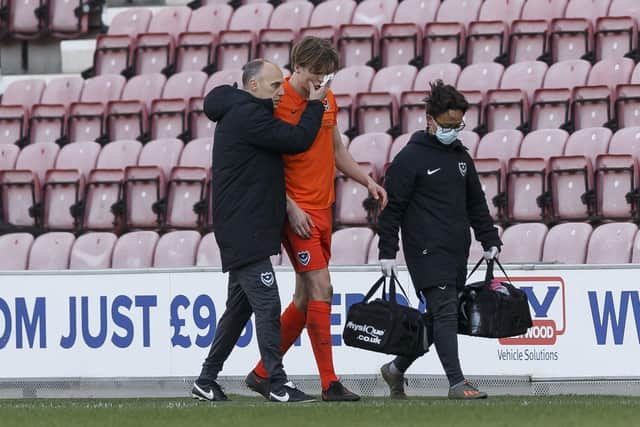 Sean Raggett of Portsmouth goes off at Wigan (Photo by Daniel Chesterton/phcimages.com)