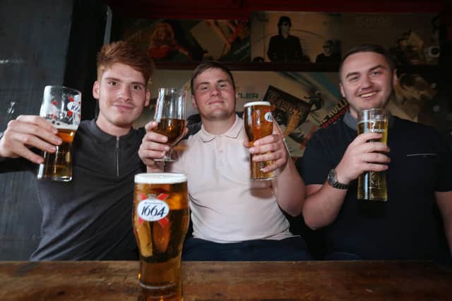 From left, Paolo Hamorak, Ryan Gisby and ryan Wiseman. Fans watch England v Ukraine in the quarter finals of Euro 2020, in The Kings pub, Albert Rd, Southsea
Picture: Chris Moorhouse (jpns 030721-12)