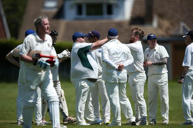 Denmead celebrates Steve Dean's wicket. Picture: Chris Moorhouse