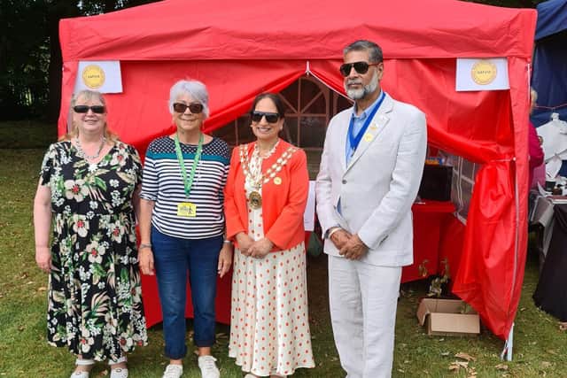 Photo of volunteers Louise and Lin, with Mayor Pal Hayre and Consort Narinder.