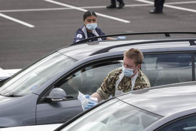 Royal Navy personnel from HMS Prince of Wales man a mobile coronavirus testing station in Hampshire. Photo: Royal Navy