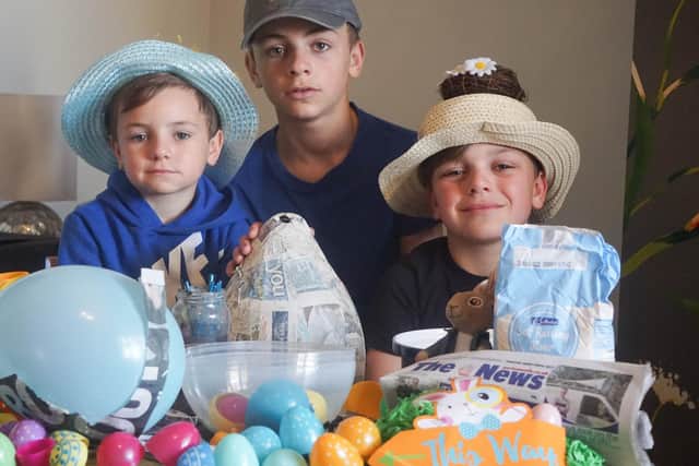 Sophia's children making their Easter bonnets. Left to right - Rex Benham Wyatt, 6, Beau Benham Wyatt, 11, and Kit Benham Wyatt, 9.