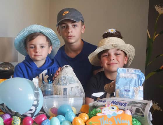 Sophia's children making their Easter bonnets. Left to right - Rex Benham Wyatt, 6, Beau Benham Wyatt, 11, and Kit Benham Wyatt, 9. 