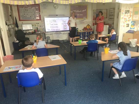 Turtle Pod learning in a socially distanced classroom.