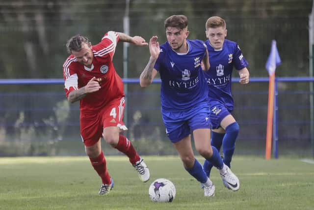 James Cowan, right, progressed from Portchester's Reserves under Pete Stiles to Oxford United. He is now at Baffins Milton Rovers. Pic: Simon Hill Photography