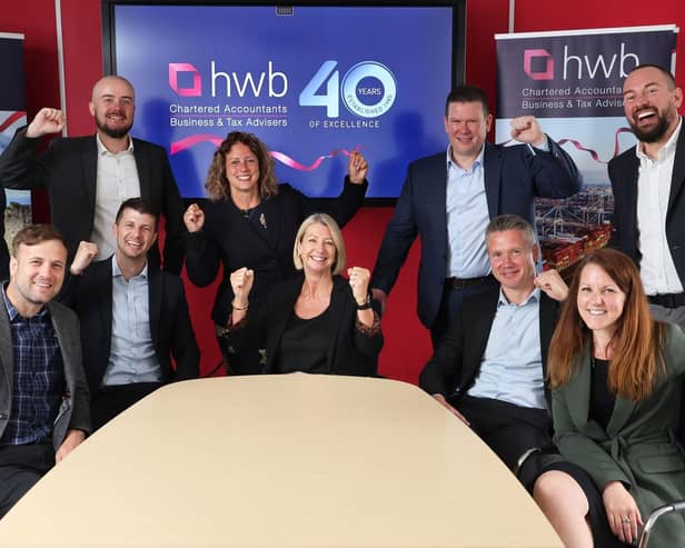 CELEBRATION TIME: Directors of HWB Chartered Accountants gathering to mark the firm’s 40th anniversary, include, back row from left, Gary Brown, Matt Cooper, Michaela Johns, Andrew Kershaw, Nick Whitemore, and, front row, James Flood, Tom Young, Tracy Jenkins (Managing Director), James Alesbury and Gemma Hedges