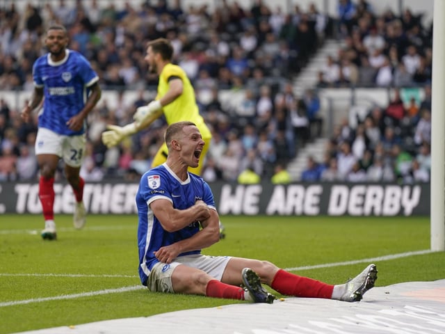 Colby Bishop mops up the applause from the Pompey fans at Pride Park