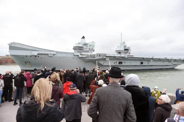 HMS Queen Elizabeth leaving Portsmouth on Thursday, November 10.
Picture: Sarah Standing (101122-5849)