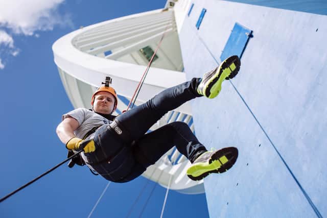 People abseiling down the Spinnaker Tower.