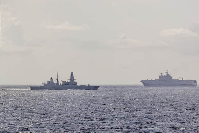 HMS Dragon, pictured left, operating with HMS Albion during an air defence exercise with the Egyptian Navy and F16 jets. Photo: Royal Navy