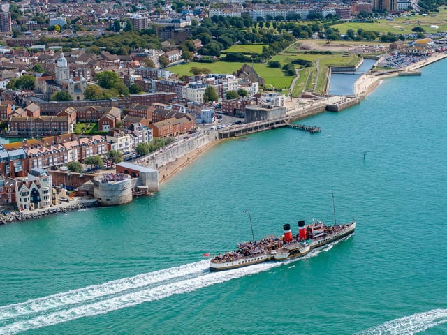 A glorious aerial picture of PS Waverley sailing past Old Portsmouth in the glorious sunshine.