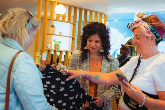 Portsmouth city councillor Charlotte Gerada at a second hand clothes sale that raised £1,300 for the Living Streets campaign