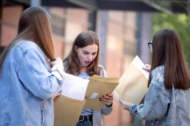 Students opening their GCSE results. Picture: Victoria Jones/PA Wire