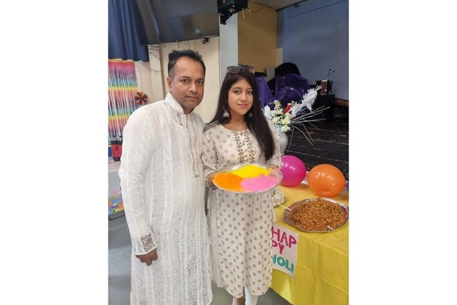 Sapan Ghosh and his daughter Simran get ready to start the festivities.