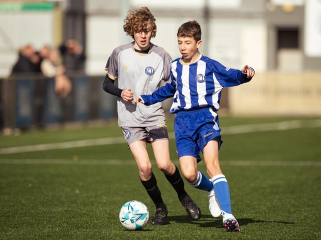 Action from the U15 Campbell McFaull Invitation Cup final between Hayling St Andrews Blue and Hayling St Andrew White. Picture: Keith Woodland (260221-87)