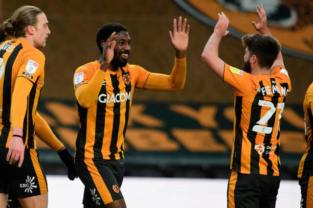 Hull City's Hakeeb Adelakun, left, celebrates his goal against Charlton today.  Picture: Andrew Vaughan - CameraSport via Getty Images