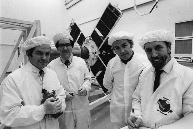 12th March 1979:  Marconi Space and Defence Systems Ltd in Portsmouth. Technicians in the Assembly, Integration and Test team are (from left to right): Roger Kenyon, Norman Thefney, Brian Pyner and Ron Roberts. They are standing in front of the UK6 satellite.  (Photo by Graham Morris/Evening Standard/Getty Images)