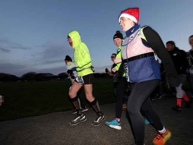 Hardy competitors in the Portsmouth Coastal Waterside Marathon were up before the sun to get to the start line. Picture: Chris  Moorhouse (221224-13)