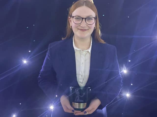 Mackenzie Bird with her award.