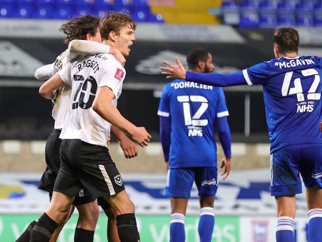 Sean Raggett celebrates his winner at Ipswich.  Picture: Nigel Keene