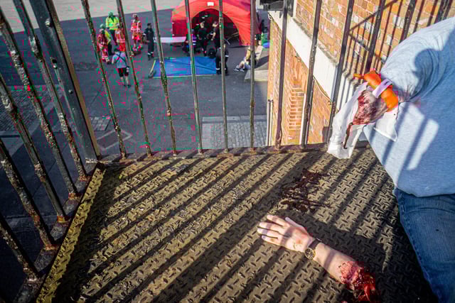 Emergency services exercise at Historic Dockyard, Portsmouth on Thursday 19th June 2025 Pictured: Actors at aftermath of improvised explosion in one of the buildings within the dockyard Picture: Habibur Rahman
