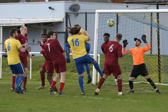 Owen Elias (16) heads Meon into a 2-0 lead against Burrfields.
Picture: Neil Marshall