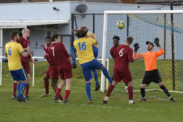 Owen Elias (16) heads Meon into a 2-0 lead against Burrfields. 

Picture: Neil Marshall