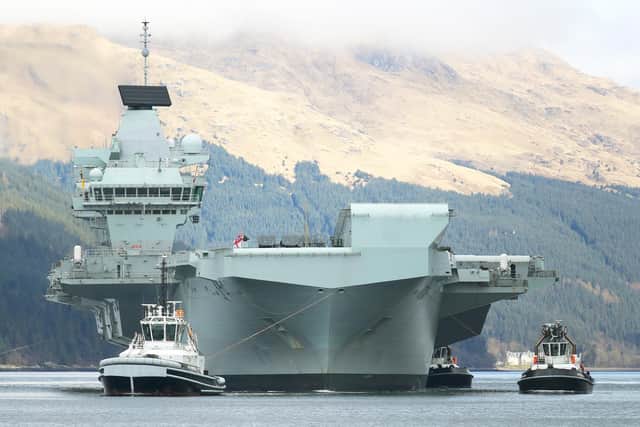 HMS Queen Elizabeth sails from Glen Mallen in Scotland. Photo: LPhot Pepe Hogan