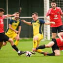 Callum Glen (yellow) has left Moneyfields to join newly-promoted Petersfield as assistant manager. Picture: Keith Woodland