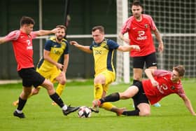 Callum Glen (yellow) has left Moneyfields to join newly-promoted Petersfield as assistant manager. Picture: Keith Woodland