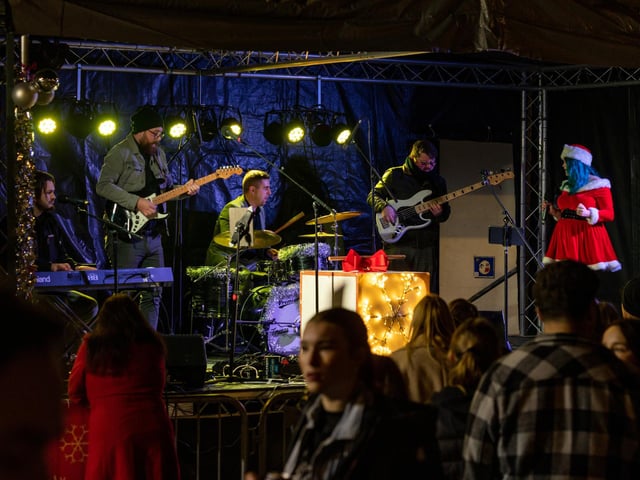 The Spoils belting out classic covers to keep the entertainment flowing in Gosport High Street. Picture: Mike Cooter (251123)