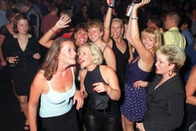 Revellers dancing the night away at Buddies 25+ nightclub at The Pyramids Centre, Southsea.