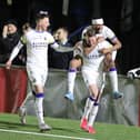 Joe Oastler  is congratulated after scoring one of his two goals in the 4-0 home win over Hungerford last March. Picture by Dave Haines.