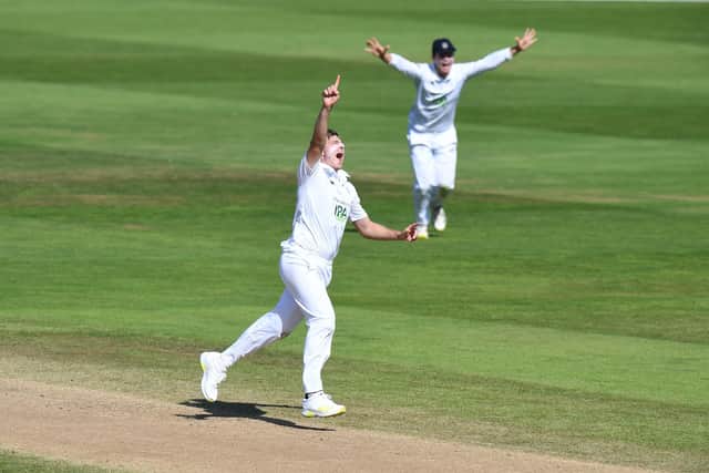 Brad Wheal celebrates dismissing Chemar Holder to wrap up Hampshire's win at Edgbaston. Photo by Tony Marshall/Getty Images.