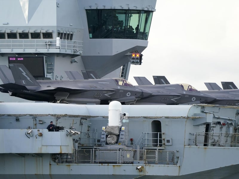 F35b jets line the deck of HMS Queen Elizabeth, as the Royal Navy aircraft carrier leaves Portsmouth Harbour. Picture date: Friday November 3, 2023. PA Photo: Andrew Matthews/PA Wire