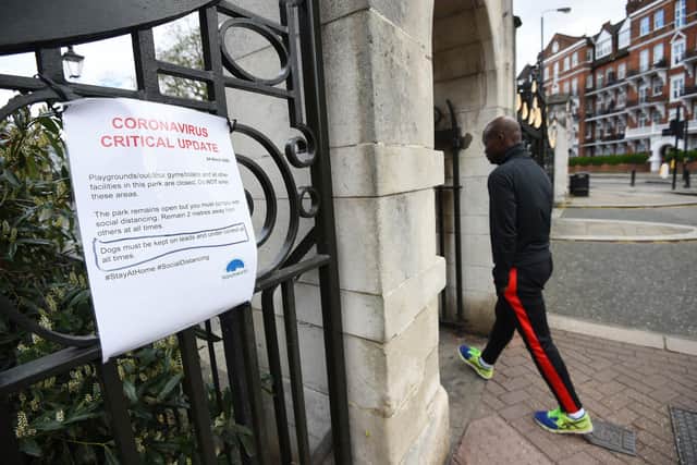 A sign at the gates of Battersea Park in London, giving information on social distancing in the park. Picture: Kirsty O'Connor/PA Wire
