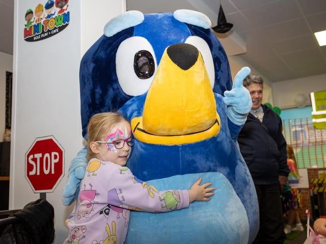 Ruby, 5, was delighted to meet Bluey at the opening of Mini Town Role Play & Cafe in Waterlooville. Photos by Alex Shute