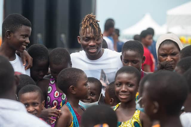 Footballer Christian Atsu, who died in the February 2023 earthquake in Turkey, was a global ambassador for Southsea charity Arms About the Child and was a regular visitor to the charity's home at Senya Beraku in Ghana